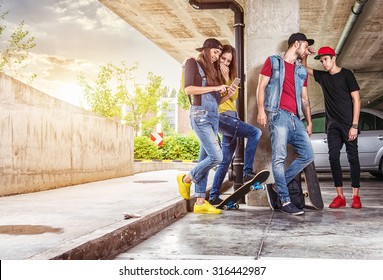 Skateboarder friends in the parking garage - Powered by Shutterstock