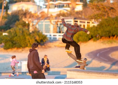 skateboarder jumping in a skatepark - Powered by Shutterstock