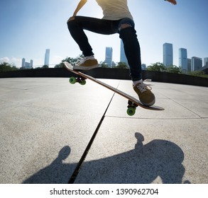 Skateboarder legs skateboarding at city - Powered by Shutterstock