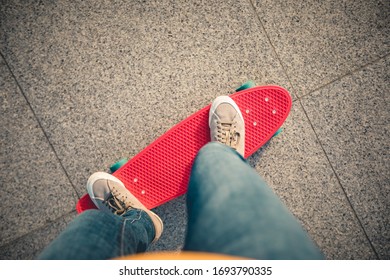 Skateboarder Legs Skateboarding At City