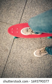 Skateboarder Legs Skateboarding At City