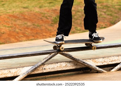 Skateboarder performing the fifty maneuver. - Powered by Shutterstock