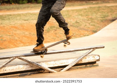 Skateboarder performing the nosegrind maneuver. - Powered by Shutterstock