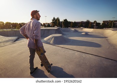 Skateboarder Portrait At Skate Park. Sunset Light, Life Style.