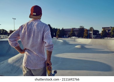 Skateboarder Portrait At Skate Park. Sunset Light, Life Style.