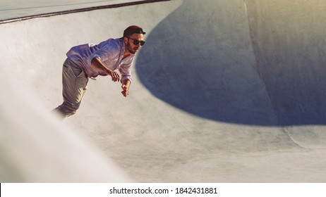 Skateboarder Portrait Sliding At Skate Park. Sunset Light, Life Style.