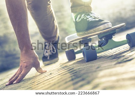 Skateboarder riding skateboard through the streets