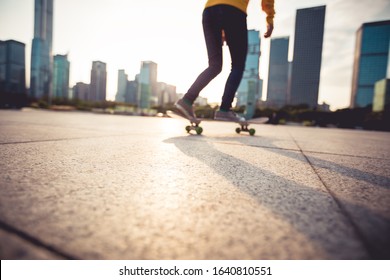 Skateboarder skateboarding at sunset city - Shutterstock ID 1640810551