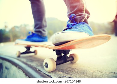   Skateboarding Legs At Skate Park