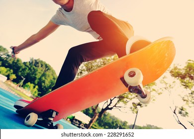 Skateboarding Woman At Skatepark