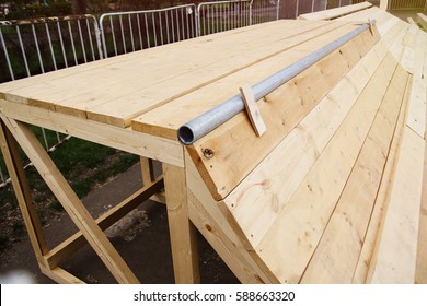 Skatepark Build.Skating Ramp Builds Process,installation Outdoors.Project Of Building Skate Park Outside.Grind Rail And Wooden Jump Radius.Wood Construction For Skating On Skateboard,roller Blade,bike