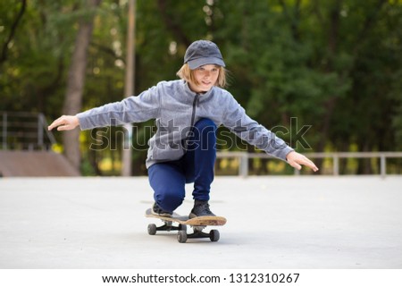 Similar – teenager practicing with skateboard at sunrise city