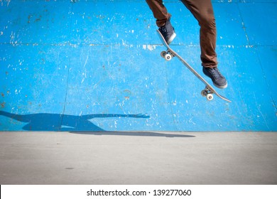 Skater jumps high in air under extrem-park - Powered by Shutterstock