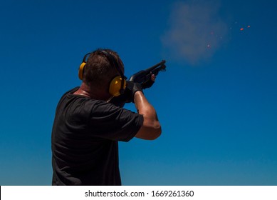 Skeet Shooting: Shooter Hits The Target  
