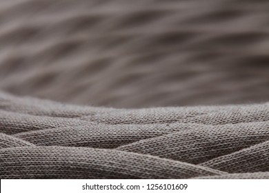 Skein Of Gray Knitted Yarn Close-up. Macro Photography Background Texture Pattern Weave Fiber Textile Fabric