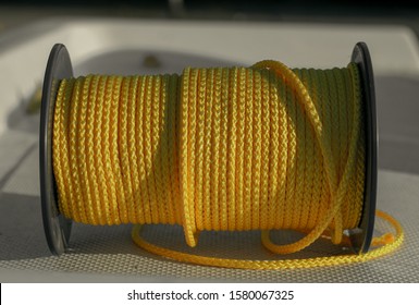 A Skein Of Yellow Climbing Rope. Yellow Strong Rope