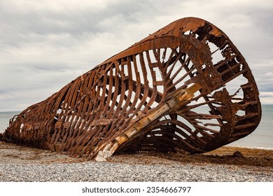 Skeleton of Shipwreck called Ambassador on the  coast of Magellan Strait, rusty warship wreck, Tierra Del Fuego, Chile