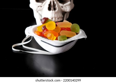 Skeleton Skull With Candy To Eat During And Face Mask For Halloween