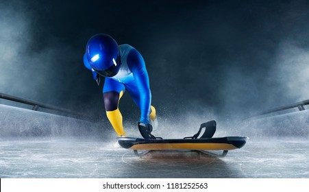 Skeleton Sport. The Athlete Descends On A Sleigh On An Ice Track. Winter Sports