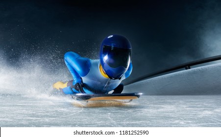 Skeleton Sport. The Athlete Descends On A Sleigh On An Ice Track. Winter Sports