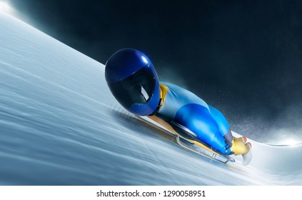 Skeleton sport. Athlete descends on a sleigh on an ice track.