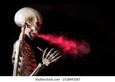 Skeleton Vaping Clouds Of Red Highlighted Vapor With An Ecigarette