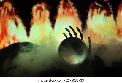Skeleton Zombie Hand Rising Out Of A GraveYard - Halloween. Mysterious magic ball predictions and smoke on dark scene. Fortune teller, mind power, prediction concept. mysterious background