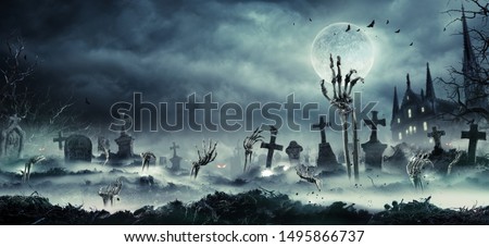 Skeleton Zombie Hands Rising Out Of A Cemetery - Halloween Background
