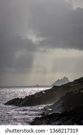 Skellig Michael Off The Coast Of The Ring Of Kerry In Winter Showing Deep Blue Waters And Crashing Waves