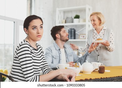 Skeptical Mood. Cheerless Young Woman Rolling Her Eyes While Being In A Skeptical Mood