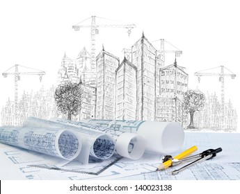 Sketching Of Modern Building Construction And  Blueprint On Architect Working Table