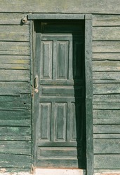Skewed Green Door At An Old Wooden Shack - Seen In Puerto De La Aldea