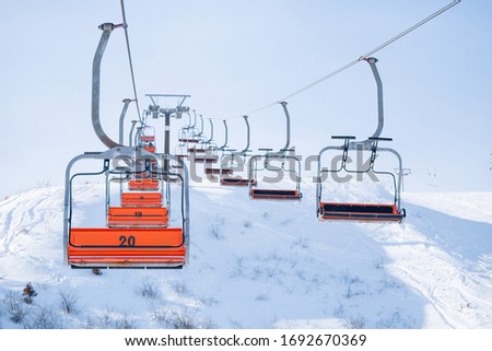 Ski elevator. Funicular in the mountains empty without people. Ski resort.
