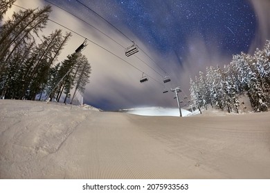 Ski Lift In The Alps At Night With Starry Sky Above