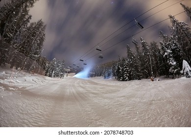 Ski Lift In The Alps At Night With Starry Sky Above