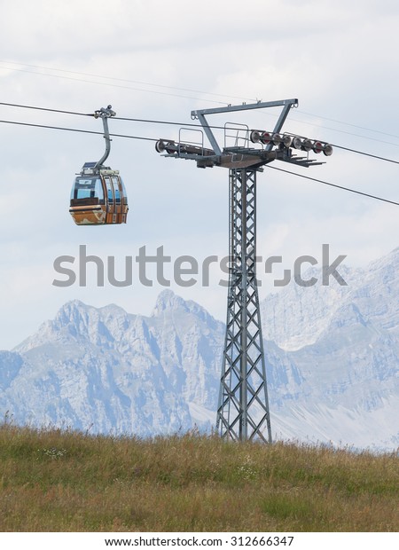 Ski lift\
cable booth or car, Switzerland in\
summer