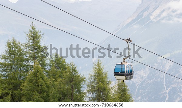 Ski lift cable\
booth or car, Austria in\
summer