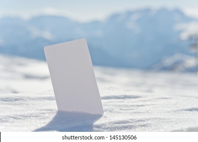 Ski Lift Pass Stuck In Snow Ready For Your Design. Concept To Illustrate Winter Sport Admission Fee