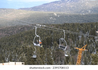 Ski Lift snowy mountain winter forest with chair lift At The Ski Resort in winter. Snowy weather Ski holidays Winter sport and outdoor activities Outdoor tourism, Bursa (Turkey), Uludağ ski lift