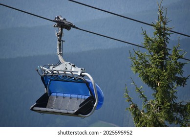 A ski lift in the summer, Spindleruv mlyn, Czech Republic, modern cable car, nature, national park, people,  forest, nature, environment, restrictions, tourism, summer season, tourists, industry,hotel