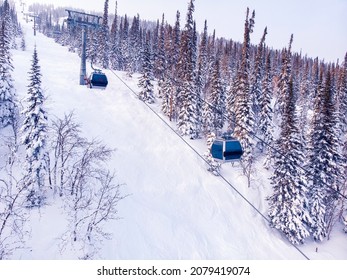 Ski Lifts Winter Mountains With Snowy Forest, Aerial Top View.