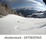 Ski mountaineering in summer in Dolomites. Piccolo Vernel summit, near Marmolada Mountain.