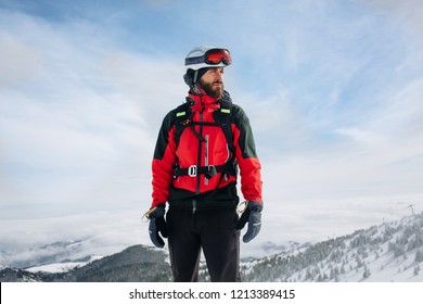 A Ski Patrol Member Top Of Mountain