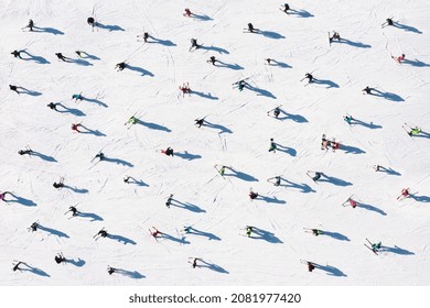 Ski resort. Aerial view of skiers and snowboarders. Winter sports. Snow slope in the mountains for sports. Photo in high resolution for the background. - Powered by Shutterstock