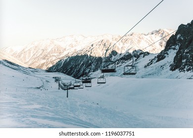 ski resort Shymbulak, Kazakhstan, Almaty, gondolas. cable car in the mountains. retro photo tinting