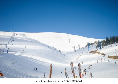 Ski slope and lifts in the Carpathians. Cableway for tourists, skiers and snowboarders. active rest in the mountains in winter. Ski resort in the Carpathians, Ukraine. Snow-covered forest and ski slop - Shutterstock ID 1023790294