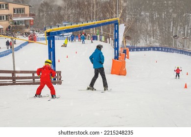 Ski slope, training slide, ski training, instructor and child student
