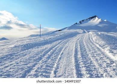 ski slopes with runway edge tracks vehicle - Powered by Shutterstock - Get 15% off with code: PIKWIZARD15