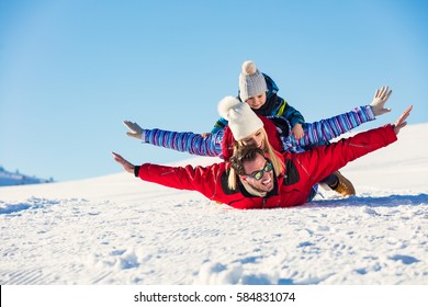 Ski, Snow Sun And Fun - Happy Family On Ski Holiday