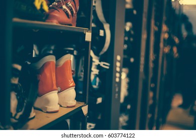 Ski And Snowboard Boots Exposed In The Rental Winter Shop